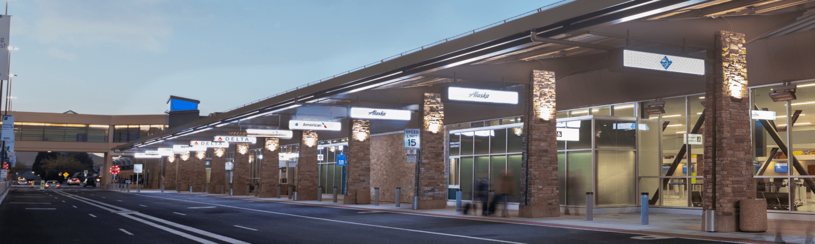 Outside front curb of the airport Ticketing Hall