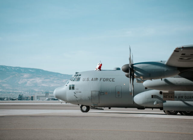 Santa Claus Arriving on a C-130 to Operation Santa Claus Event