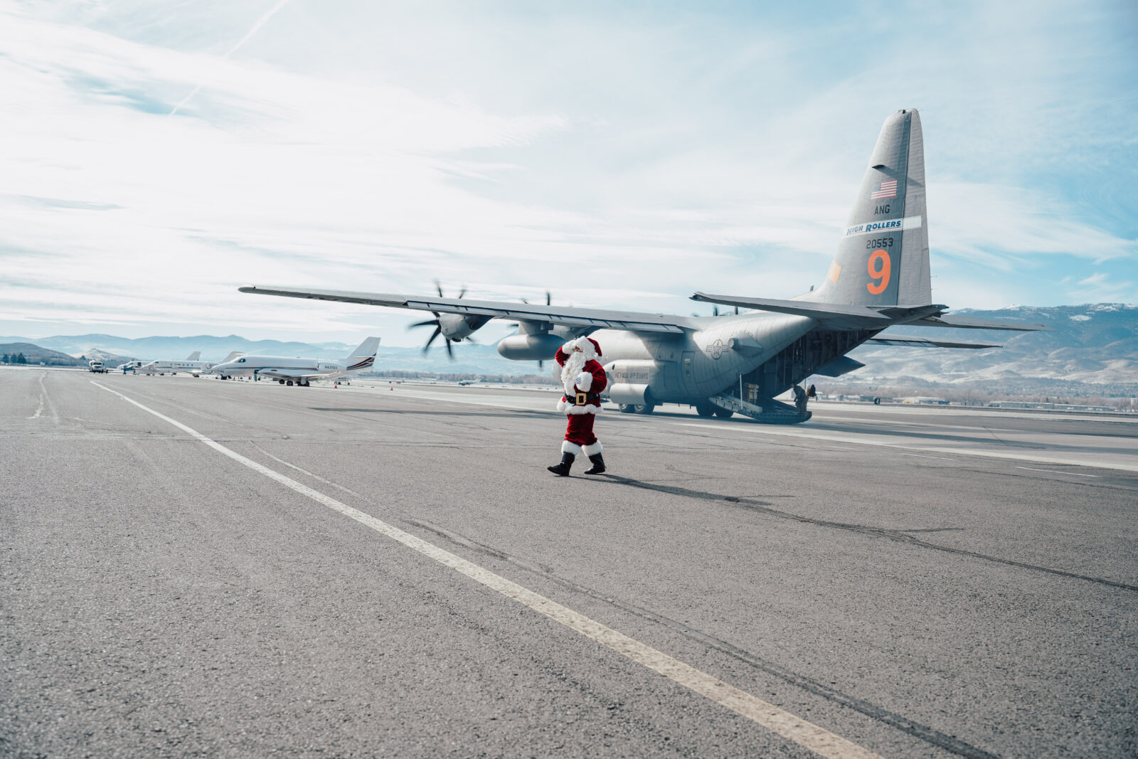 Operation Santa Claus event with Santa and C-130 aircraft