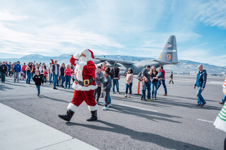 Operation Santa Claus event with Santa and crowd