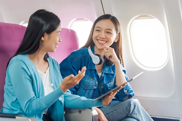 stock image of two people in a plane