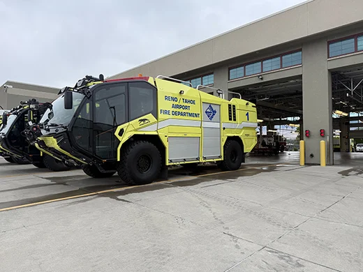 Reno-Tahoe Airport fire department emergency response vehicle outside hangar