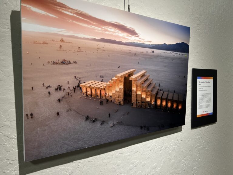Photography on wall containing temple statue