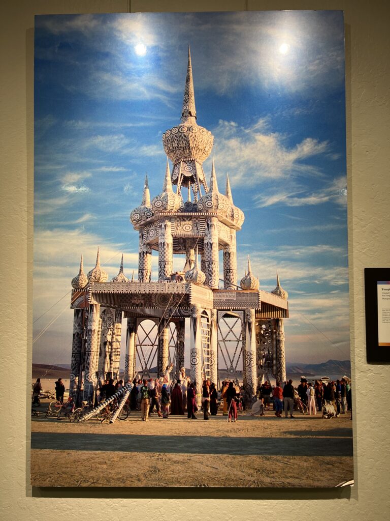 Photography on wall containing temple statue