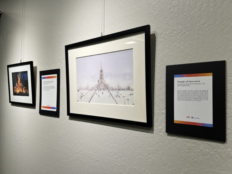 Photography on wall containing temple statues