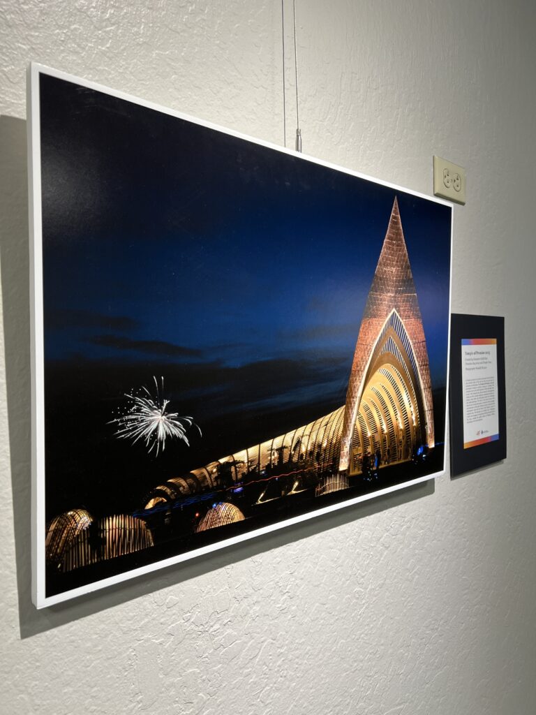 Photography on wall containing temple statue